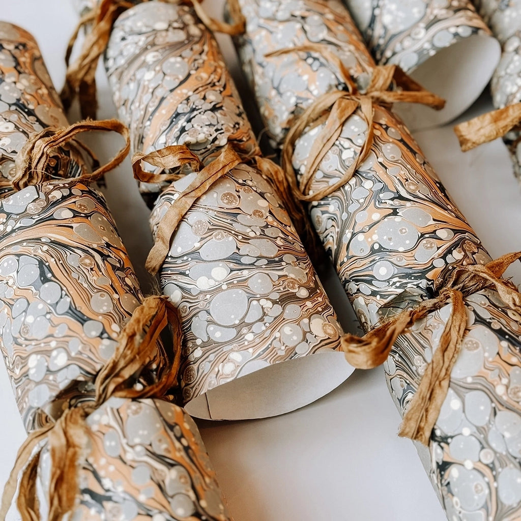 A close up of our Marbled Christmas Crackers by Petra & Co.