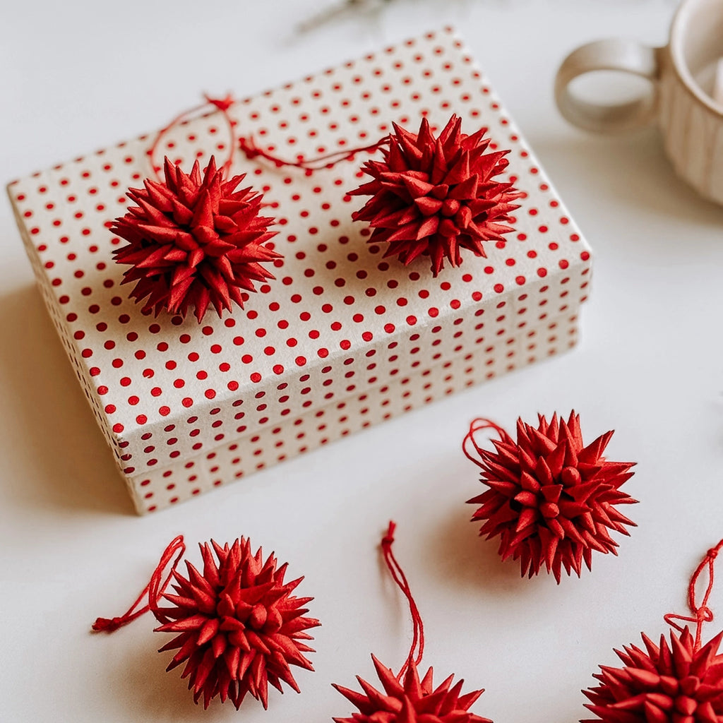 A set of 6 red hand made quilled paper Christmas Tree Decorations with a beautiful red spotted paper display box.