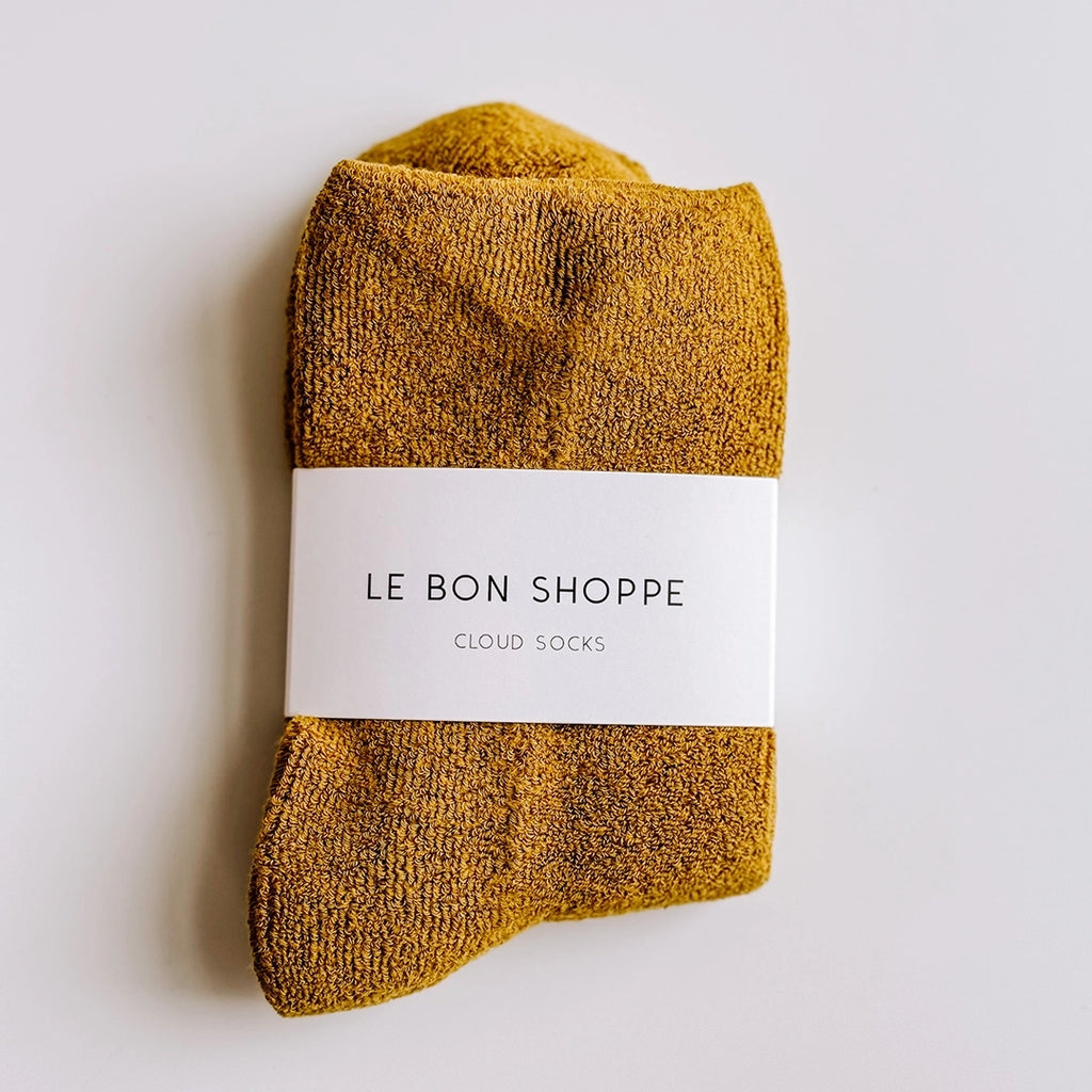 A pair of Cloud Socks by Le Bon Shoppe in Olive. byFoke.