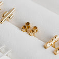 Tiny Double Tube Studs in Gold by Matthew Calvin